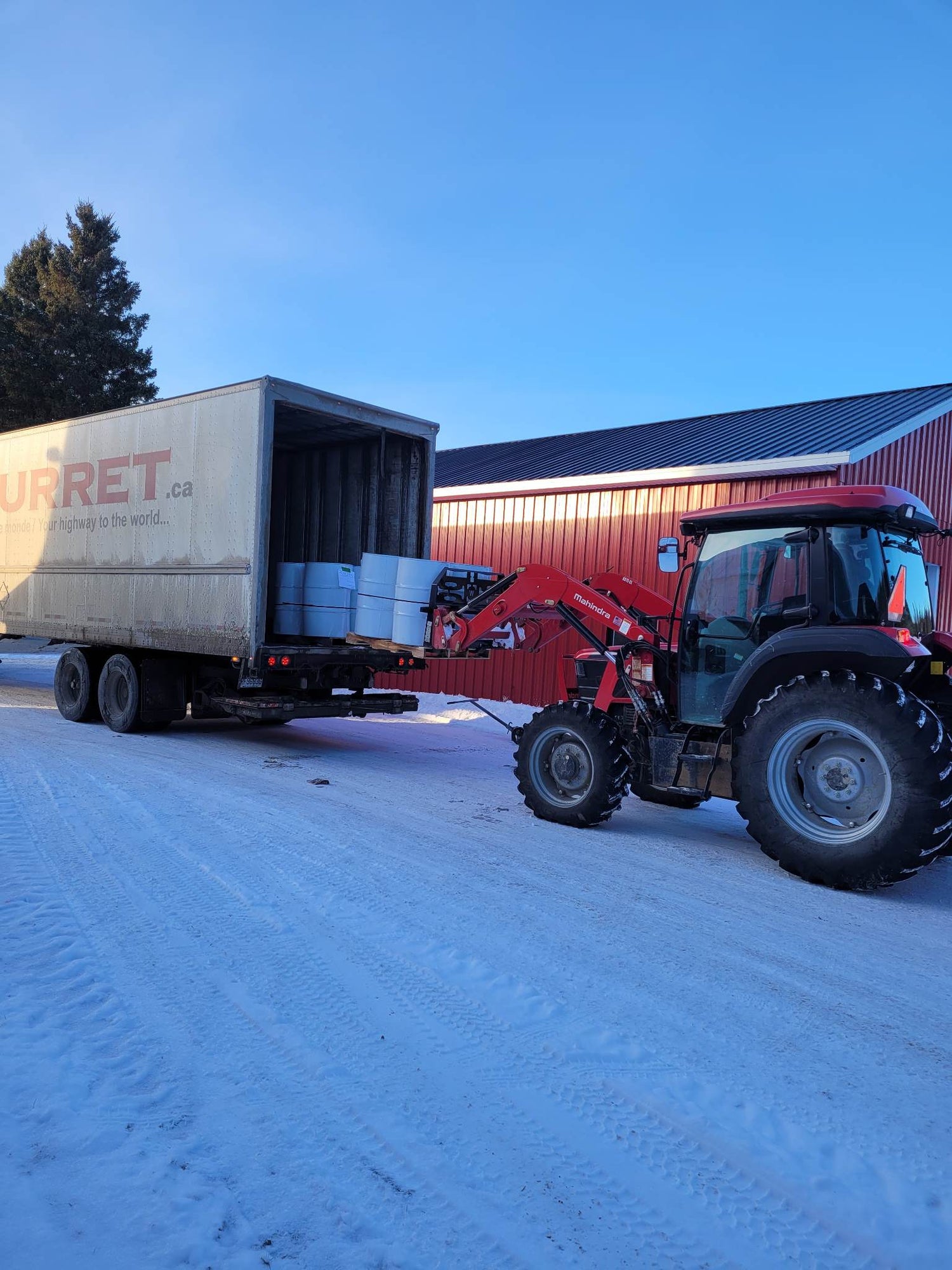 Loading maple syrup pallet before delivery
